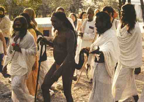 Yoga Guru Sri Tat Wale Baba - Rishi of the Himalayas - leaving lecture hall.